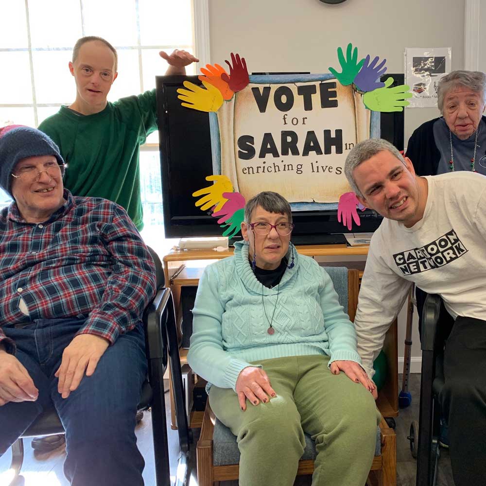 North Haven Adult Attendees holding Vote for SARAH Signs