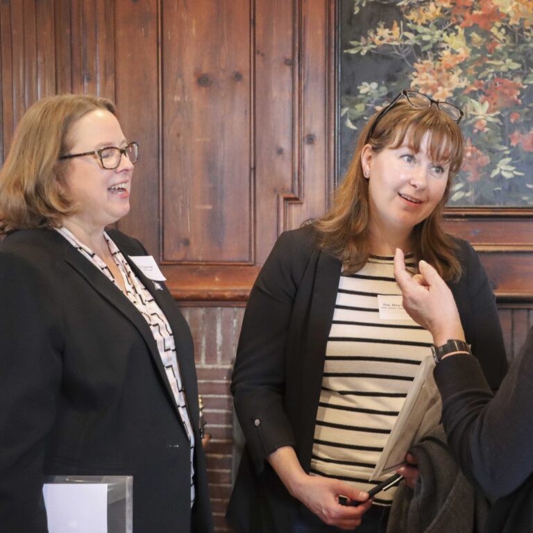 State Representatives Sarah Keitt and Mary Welander talking with Julie Hall of SARAH Inc. KIDSTEPS